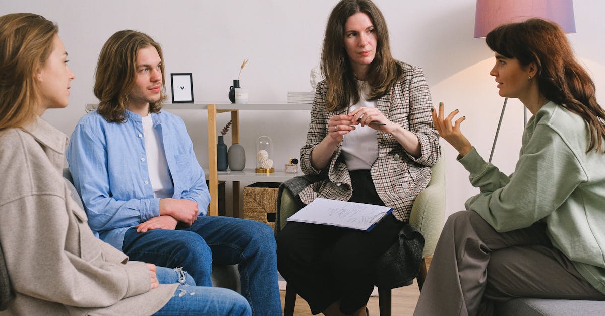 Woman discussing problem during group therapy